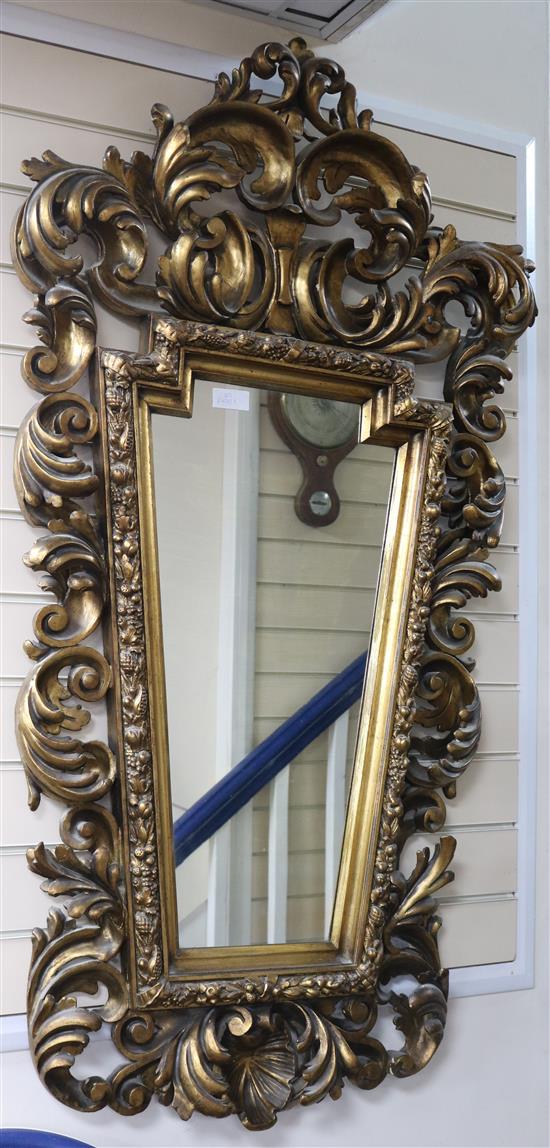 A cartouche shaped gilt wall mirror W.75cm